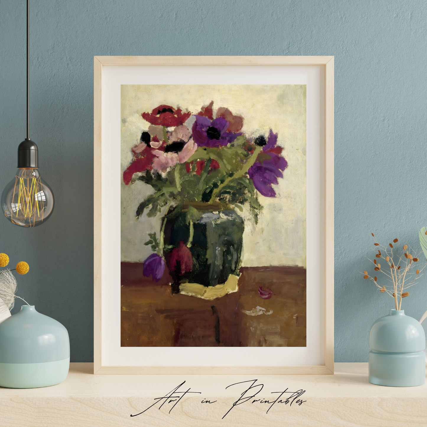 Framed painting of flowers on a wall with decorative vases and a light bulb.