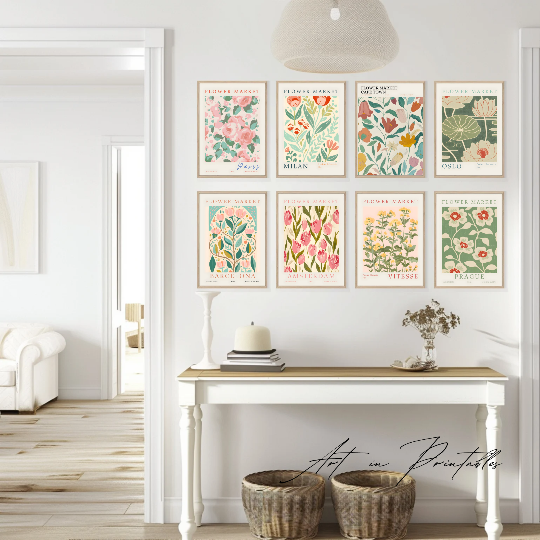 Decorative floral prints on a wall above a white console table in a room.